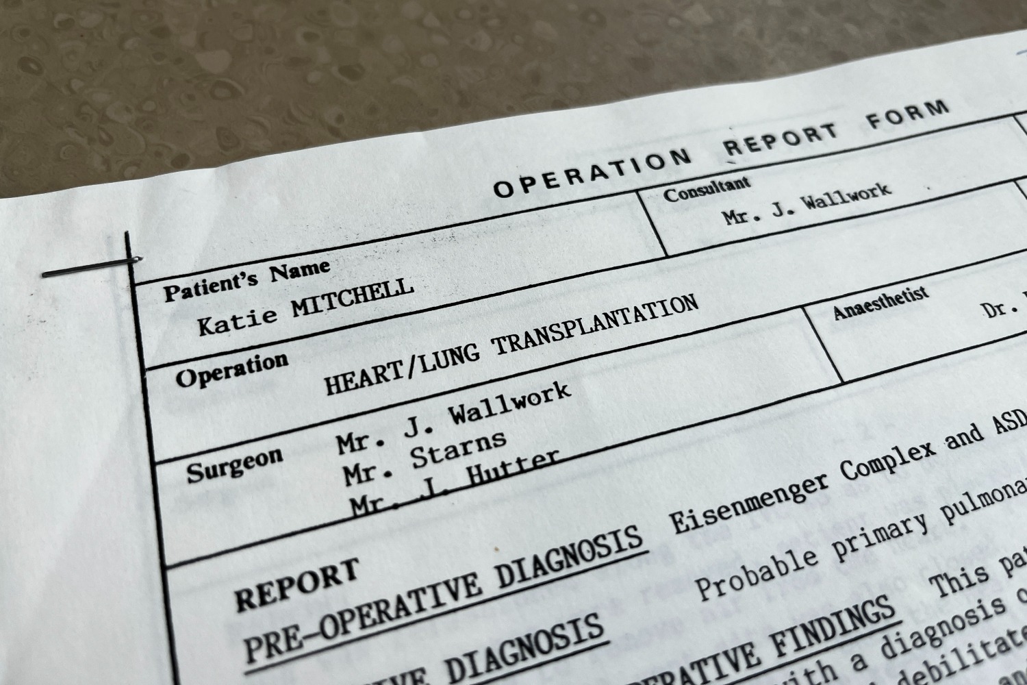 A bit of paper saying 'Operation Report Form' in typewriter font