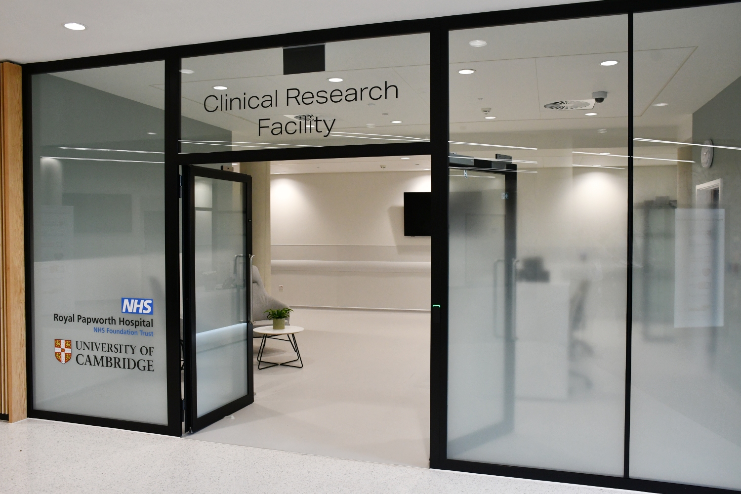 Some doors with the words Clinical Research Facility. 