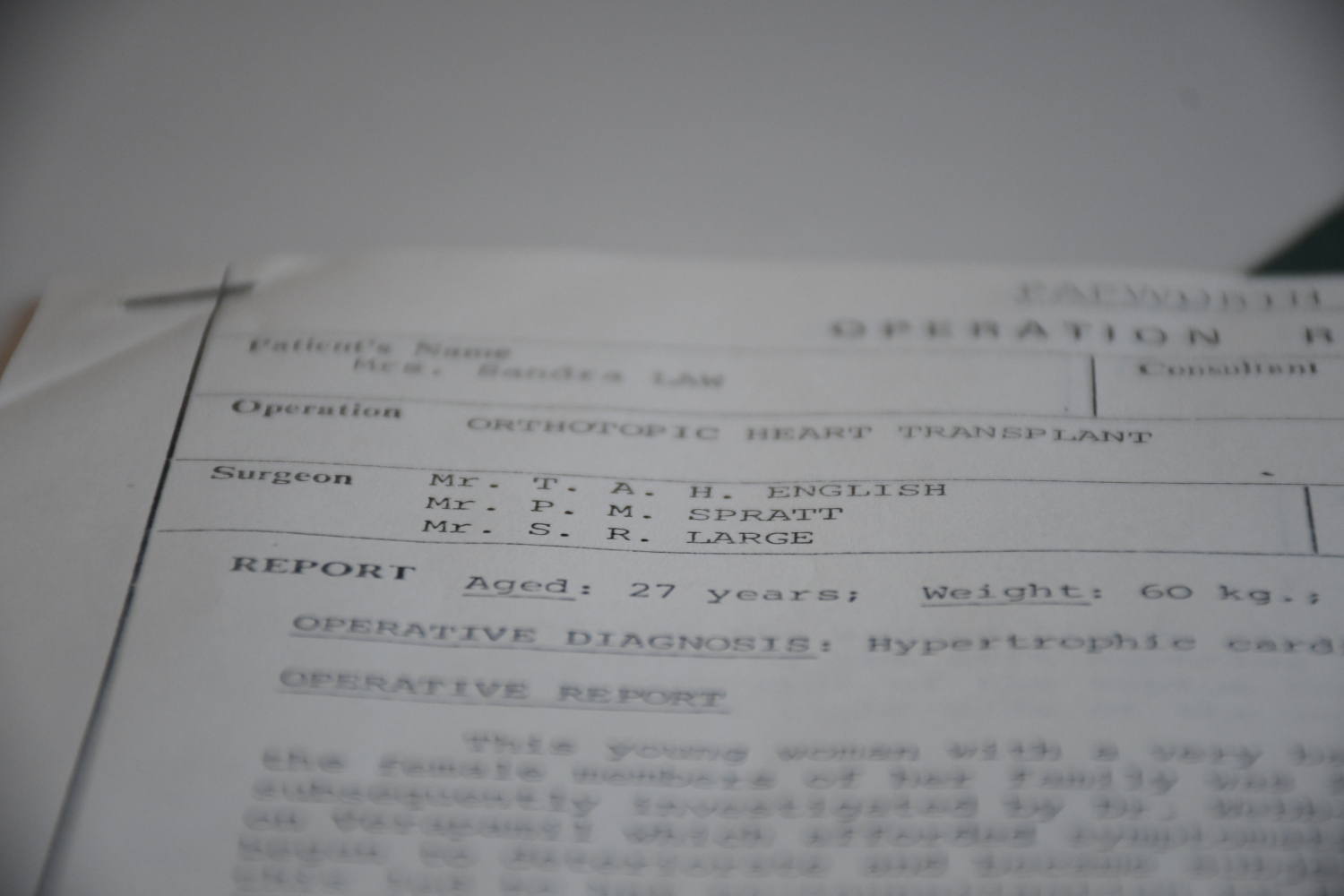 An old piece of paper saying 'Operation Report Form' with typewriter font notes.
