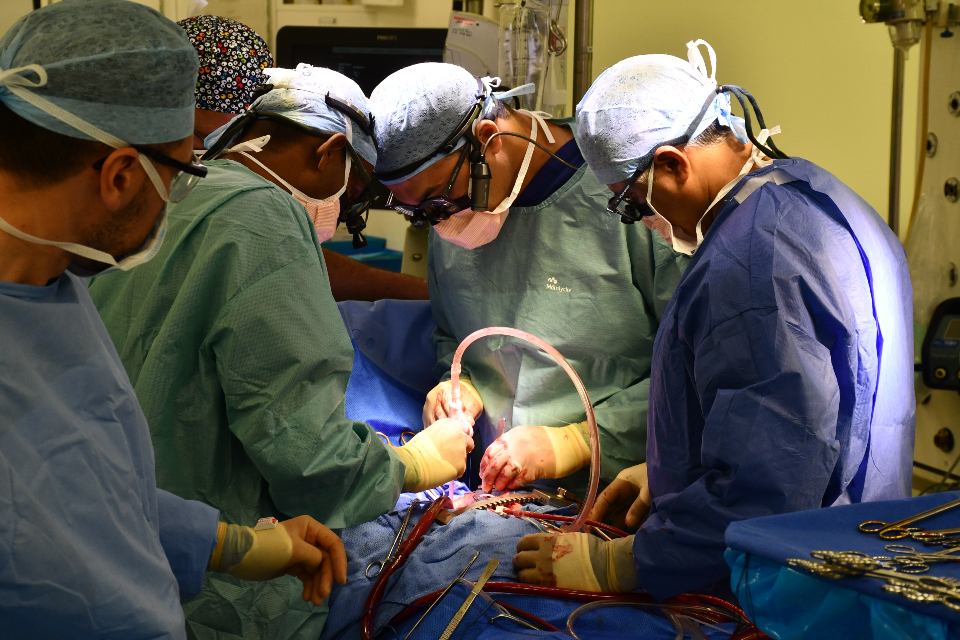 Surgeons operating.